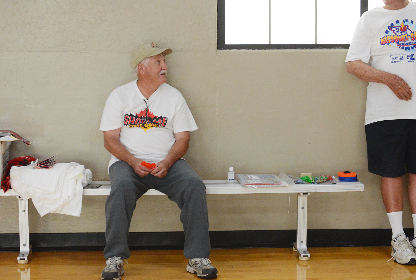 Larry Joe Pauley sits on a bench